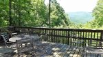 Back deck with ample seating and mountain view